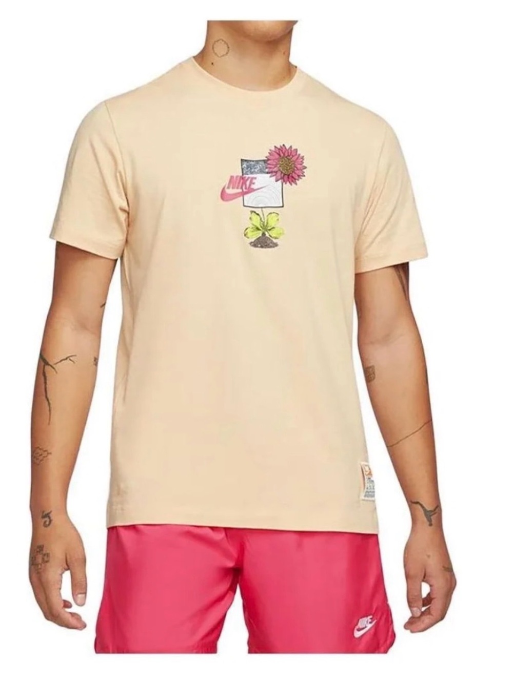 Nike Peach Short-Sleeve Graphic Tee with Floral Logo